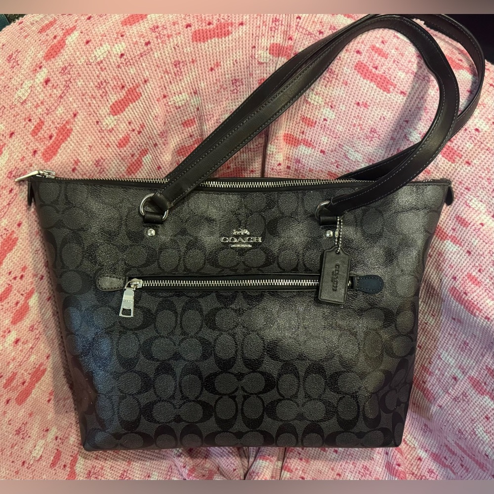 Big like new Coach bag. Dark grey with black C’s lots of room